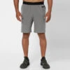 Pantalón Corto Fitness Hombre Gris Rendimiento Transpirable Bolsillos Cremallera