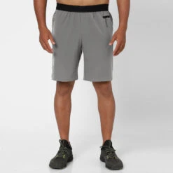 Pantalón Corto Fitness Hombre Gris Rendimiento Transpirable Bolsillos Cremallera